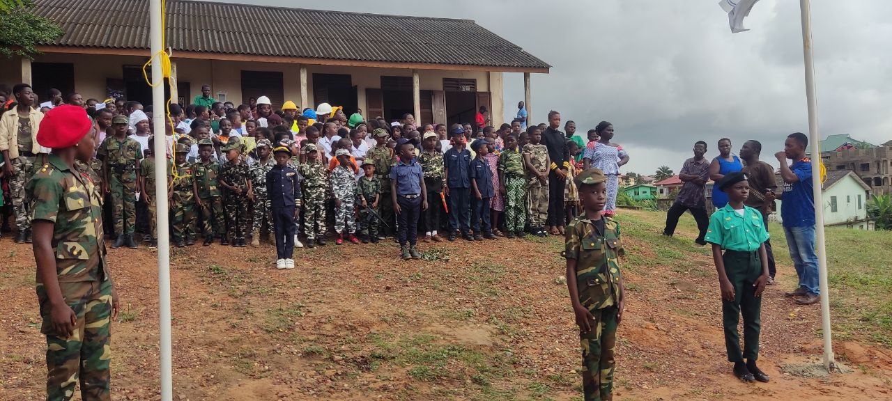 Teacher helping young student