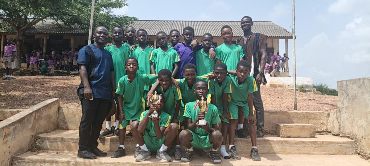 School Athlete With Trophies Won During the Inter schools Competition
