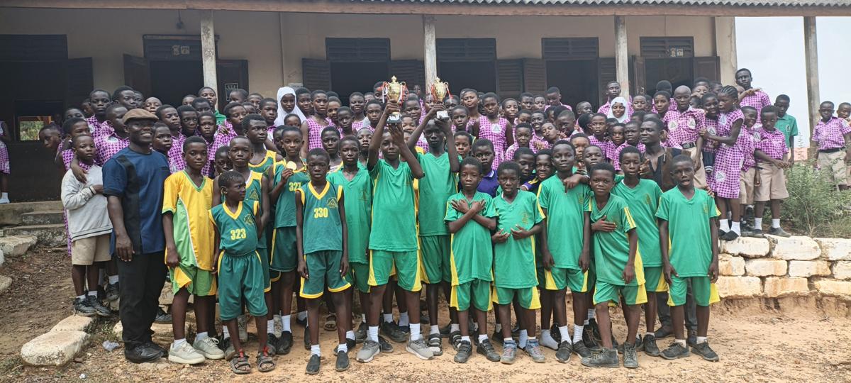School Athlete With Trophies Won During the Inter schools Competition